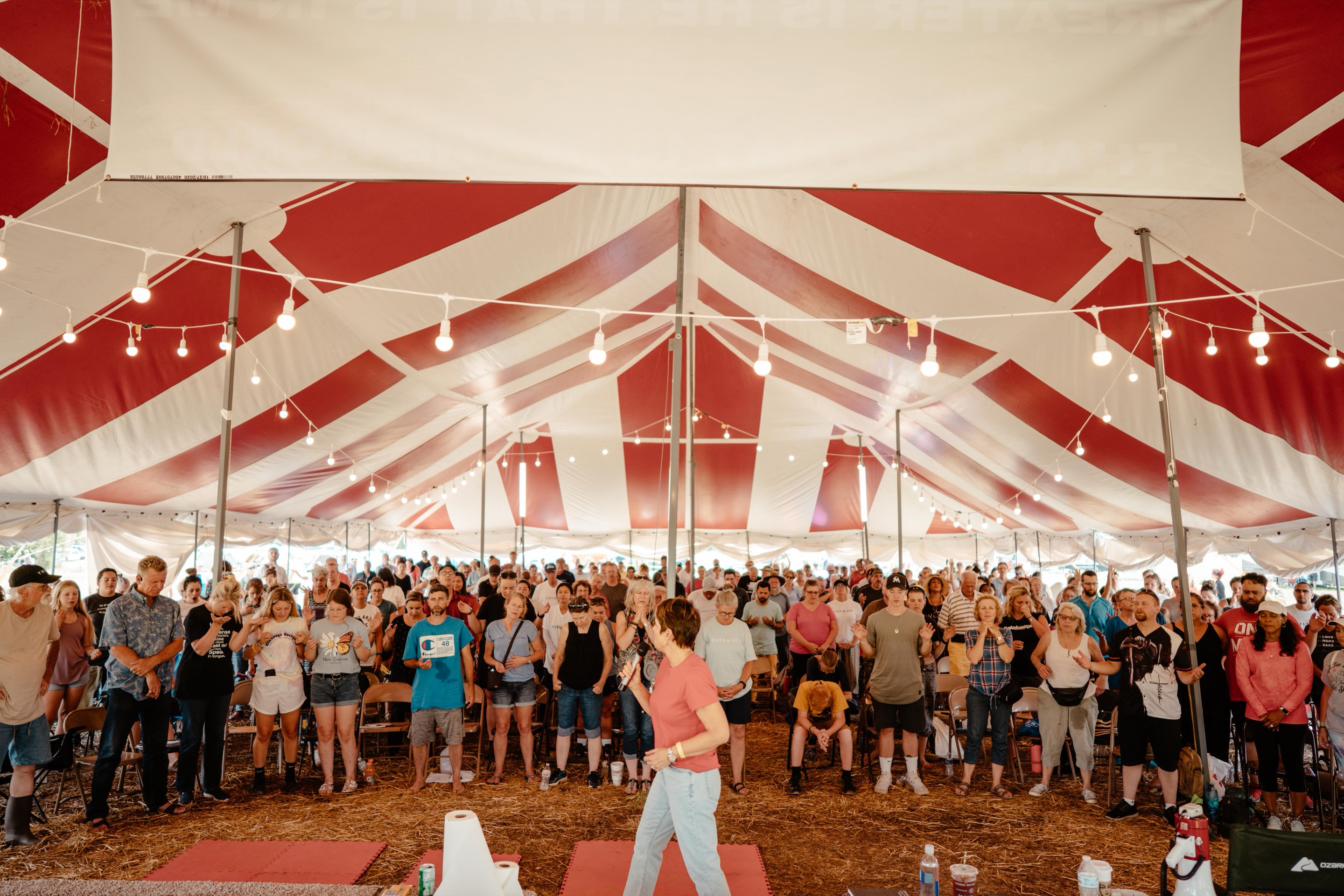 Believers gathered in prayer on the mission field